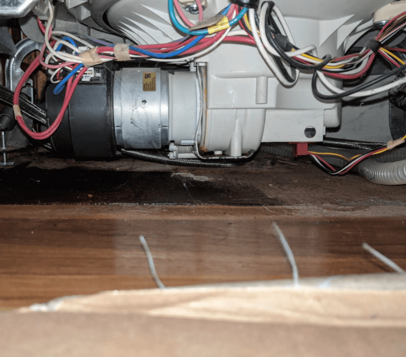 Wirespipes and machinery under dishwasher