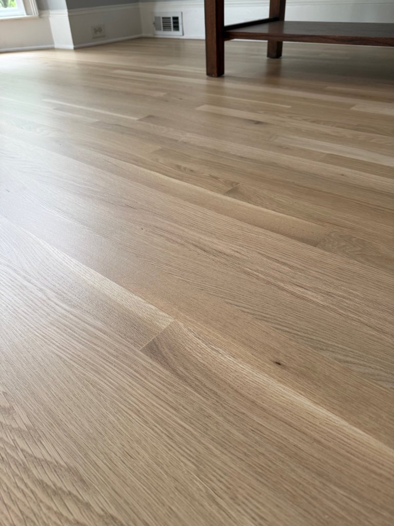 Close-up of newly installed and finished white oak flooring