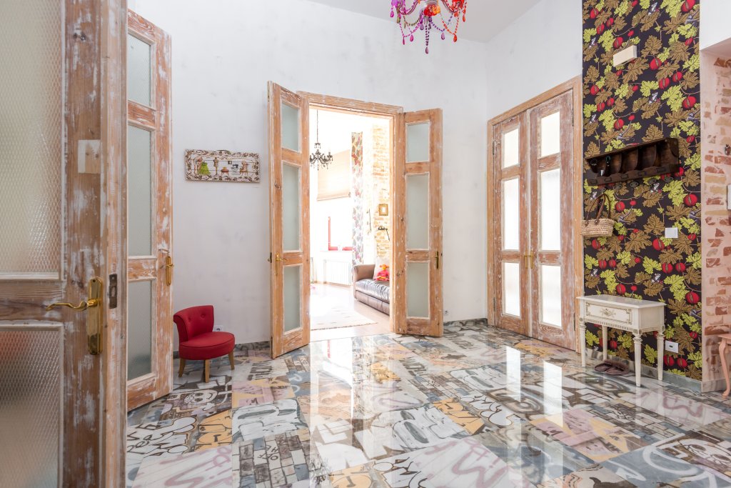 Colorful interior with wood flooring and vivid walls